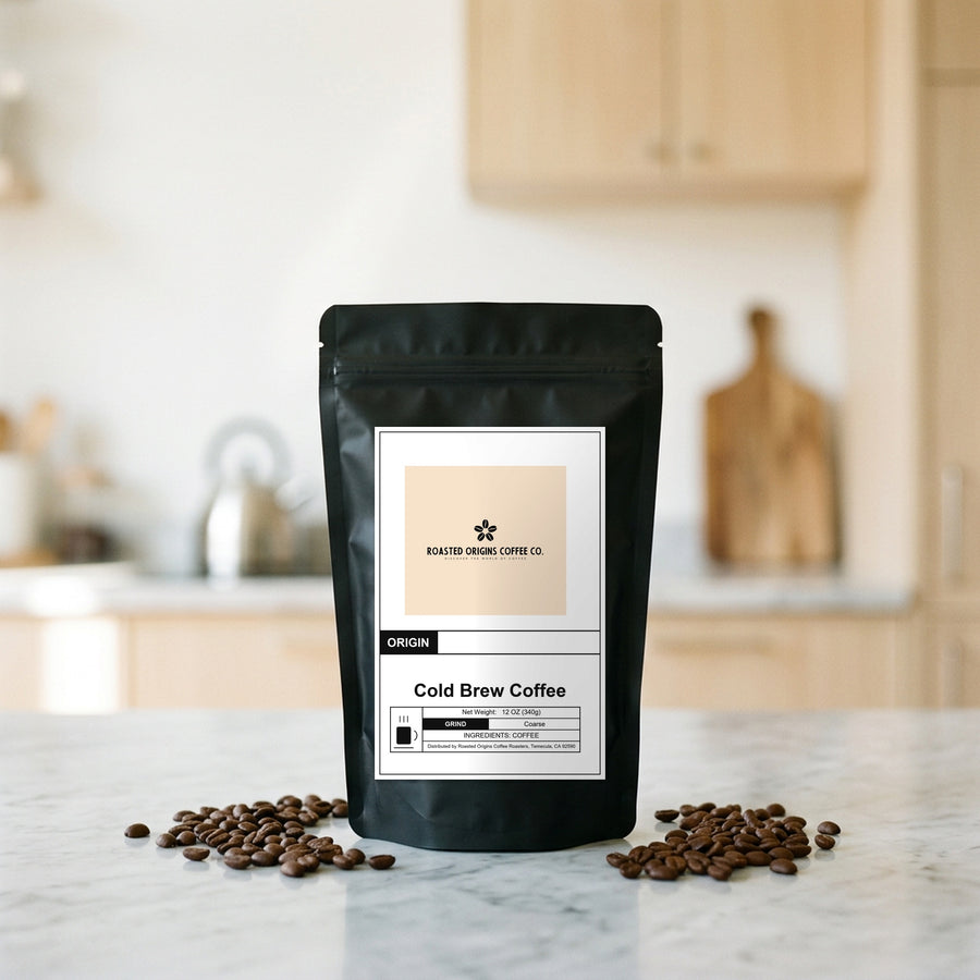 Cold Brew Coffee bag standing on a marble kitchen counter, roasted beans scattered at its base