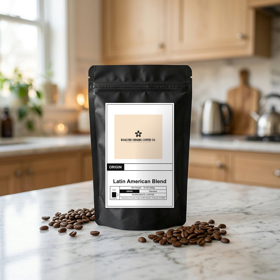 Latin American Blend coffee bag standing on a marble kitchen counter, roasted beans scattered at its base